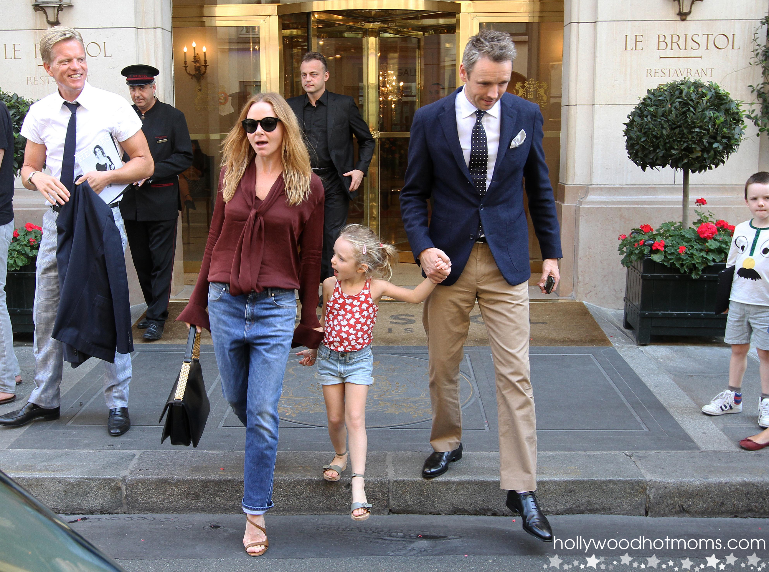 Stella McCartney with her husband Alasdhair Willis going out of the Ritz Hotel in Paris.
